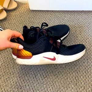 Womens black with red and gold Nike sneakers